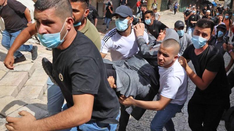 إصابة العشرات بمواجهات خلال «مسيرة الأعلام» في القدس | صحيفة الخليج