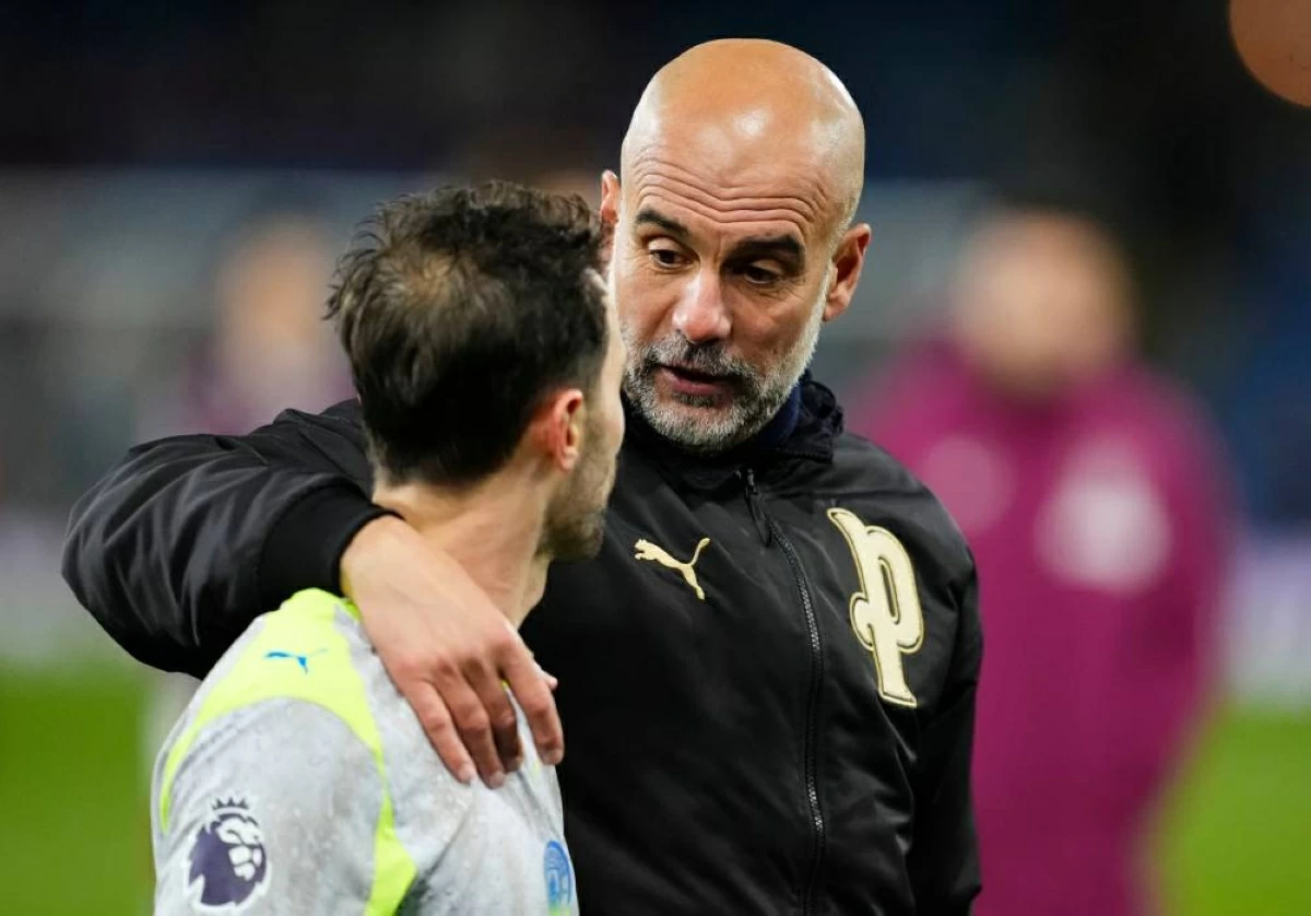 غوارديولا يتحدث مع سيلفا