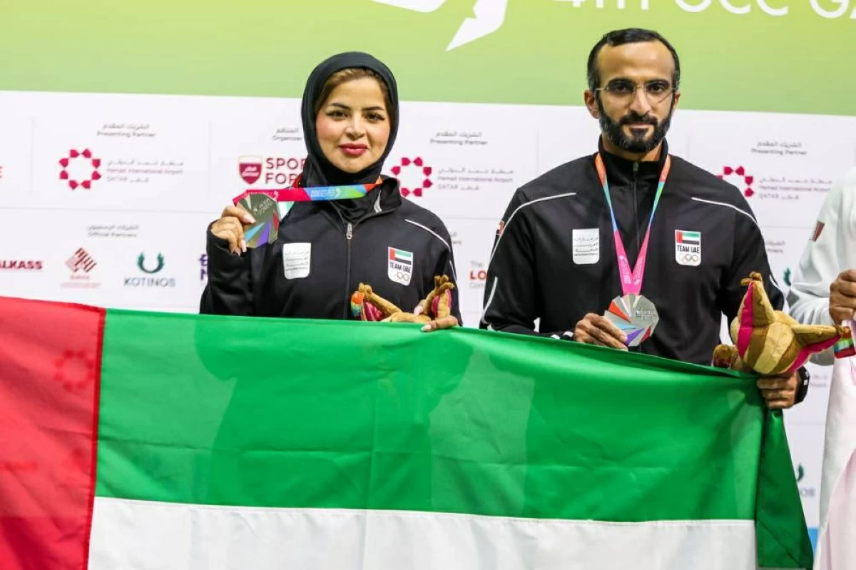 محمد آل مكتوم وعاشة إلياسي خلال التتويج