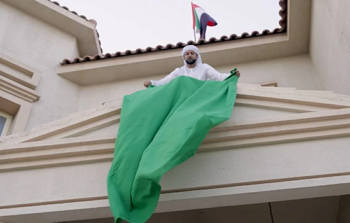 «فرجان دبي» تستقبل الحجاج بالأعلام الخضراء