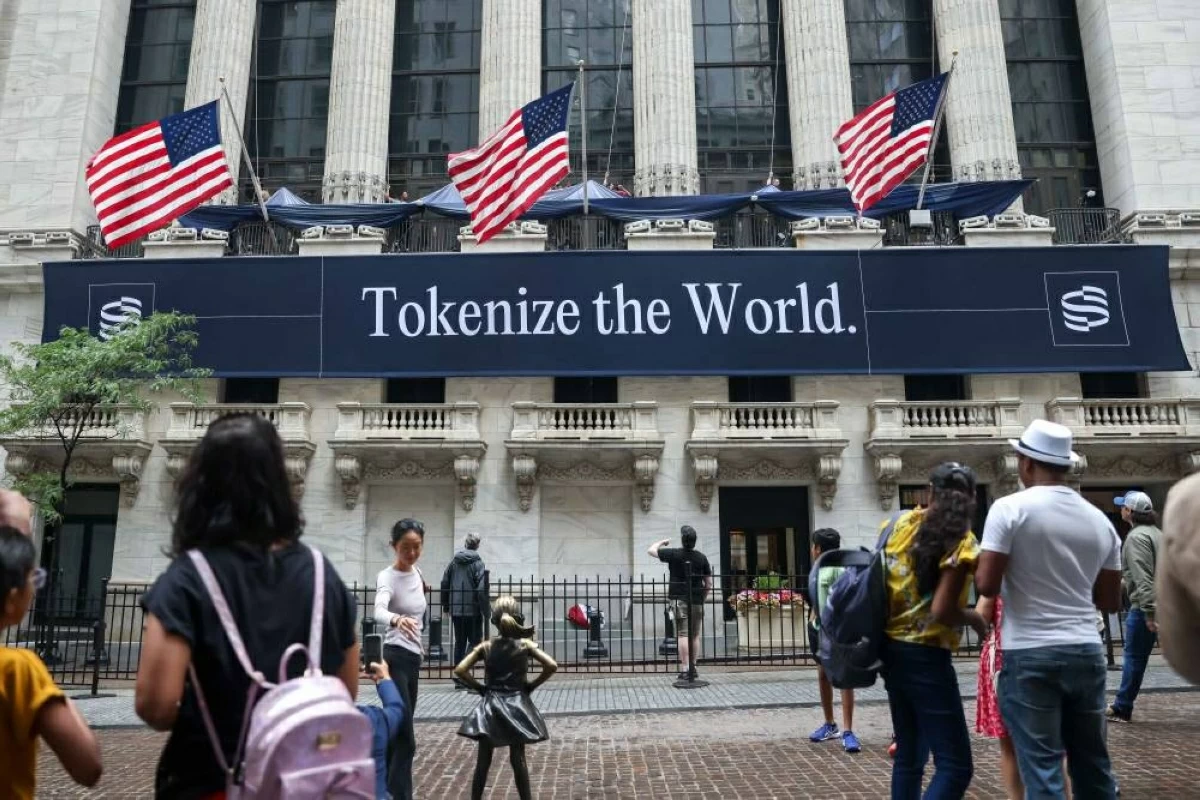 Securitize Inc. 'Tokenize the World' signage at the New York Stock Exchange (NYSE) in New York, US, on Monday, July 6, 2026. US President Donald Trump rang the opening bell for the New York Stock Exchange and the Nasdaq from the Oval Office on Monday, a celebratory event to mark the launch of Trump Accounts, a new investment vehicle for children. Photographer: Michael Nagle/Bloomberg