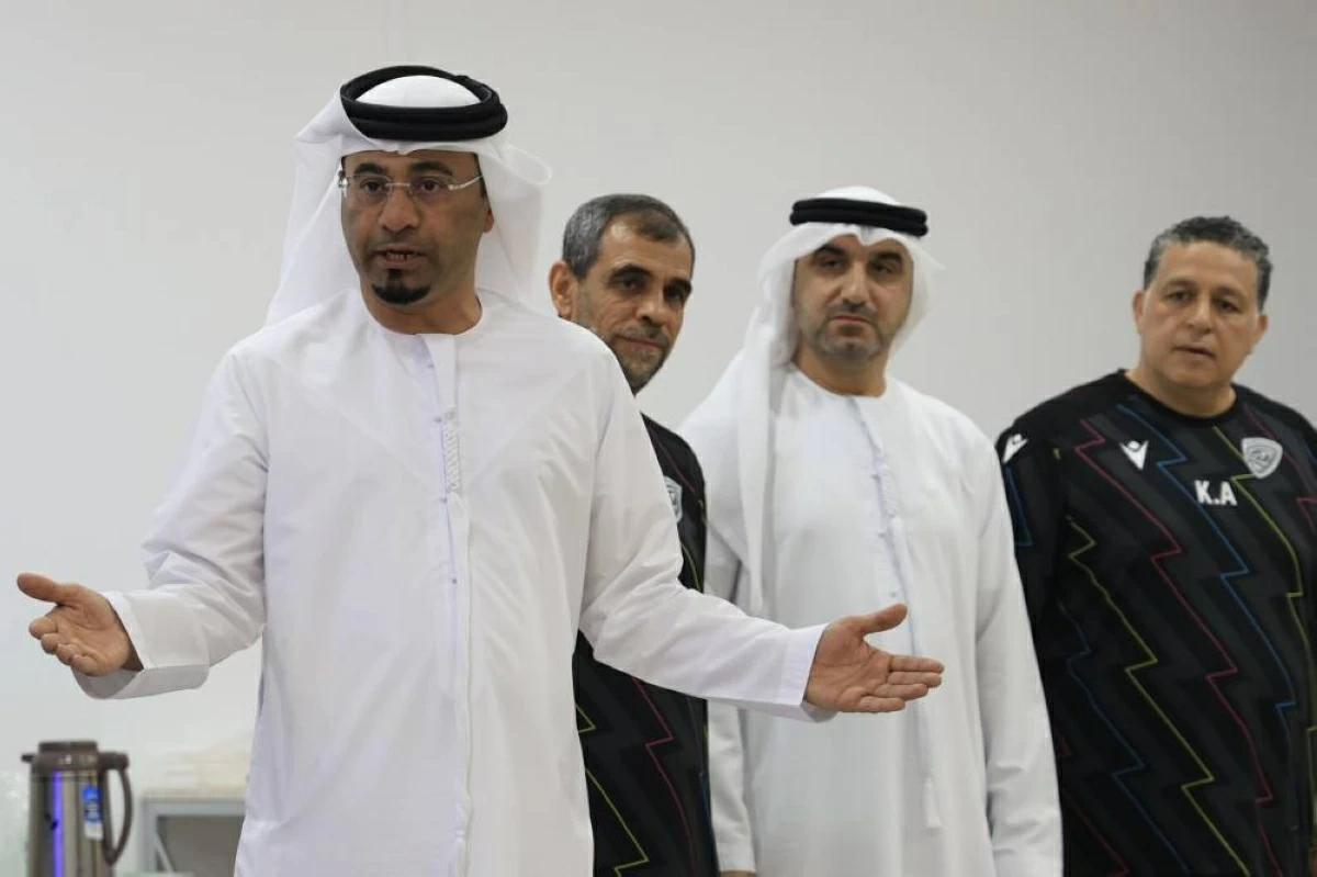 عبدالله النجار مع المدرب النمر