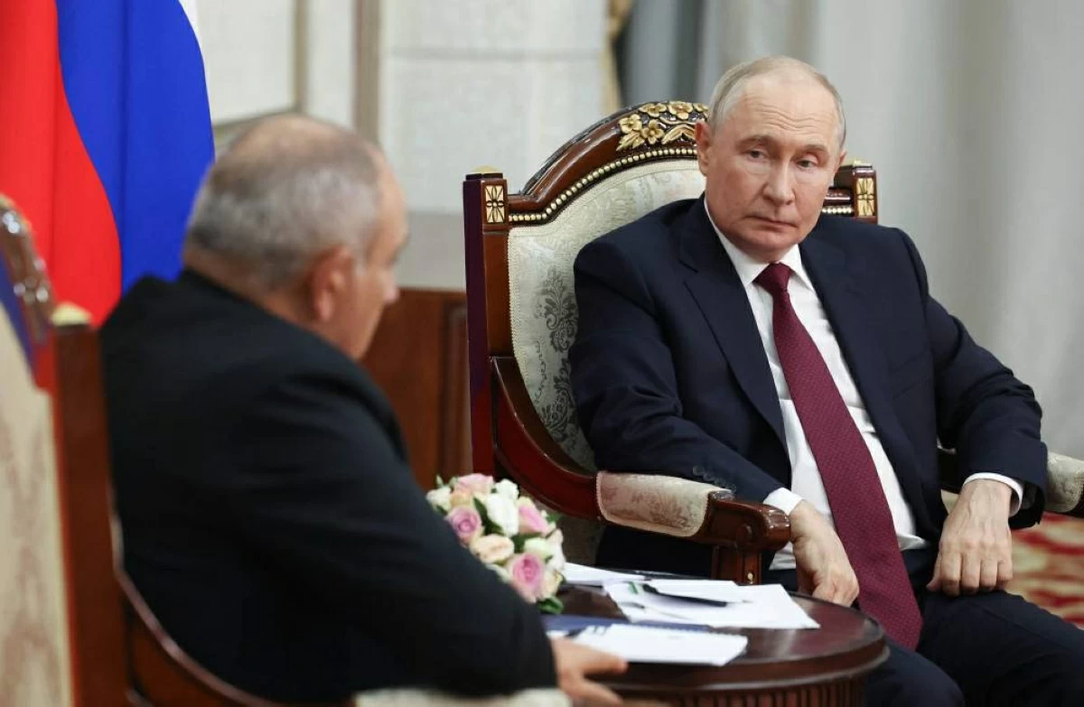 In this pool photograph distributed by the Russian state agency Sputnik, Russia's President Vladimir Putin and Armenian Prime Minister Nikol Pashinyan hold a meeting on the sidelines of the Shanghai Cooperation Organisation (SCO) summit in Bishkek on September 1, 2026. (Photo by Vyacheslav PROKOFYEV / POOL / AFP)