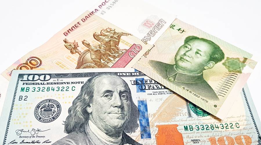 Image:الدولار يحكم عالم المال.. واليوان شاهد على العصر