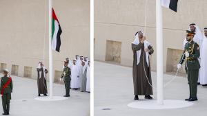 محمد بن زايد يرفع علم الإمارات