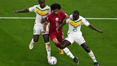 من لقاء قطر والسنغال