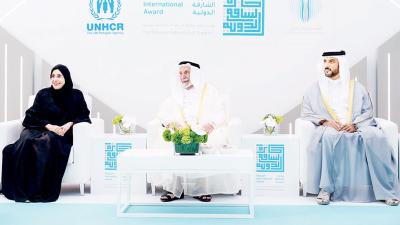 سلطان وسلطان بن أحمد والشيخة جواهر خلال حفل تكريم المنظمة