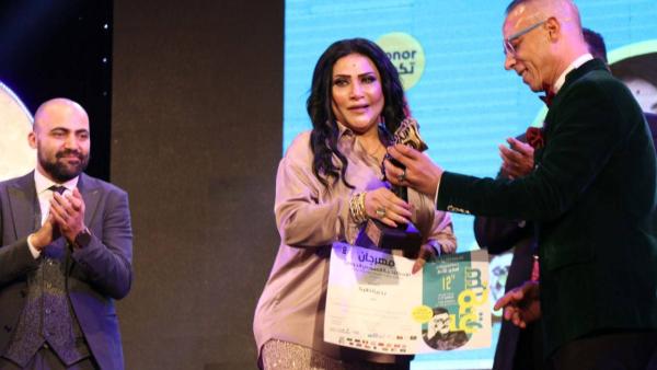 الفنانة بدرية طلبة خلال التكريم