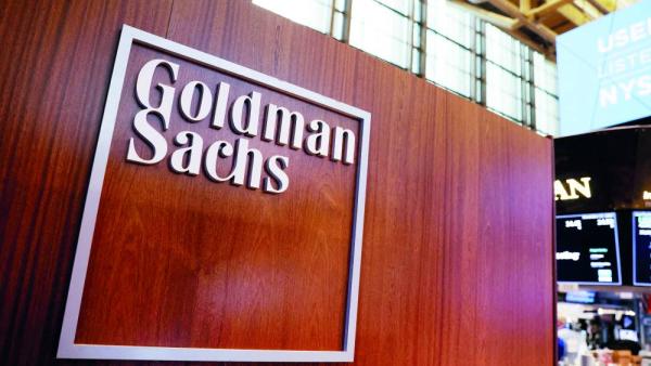 FILE PHOTO The logo for Goldman Sachs is seen on the trading floor at the New York Stock Exchange (NYSE) in New York City, New York, U.S., November 17, 2021. REUTERS/Andrew Kelly//File Photo