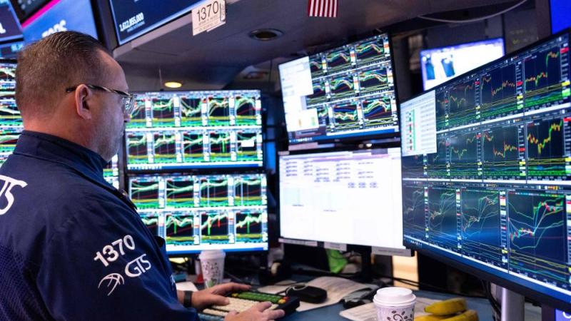 متداولون يعملون في بورصة نيويورك (أ.ف.ب)