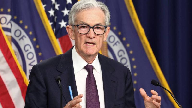FILE PHOTO: U.S. Federal Reserve Chair Jerome Powell speaks during a press conference following a two-day meeting of the Federal Open Market Committee on interest rate policy in Washington, D.C., U.S., May 7, 2025. REUTERS/Kevin Lamarque/File Photo