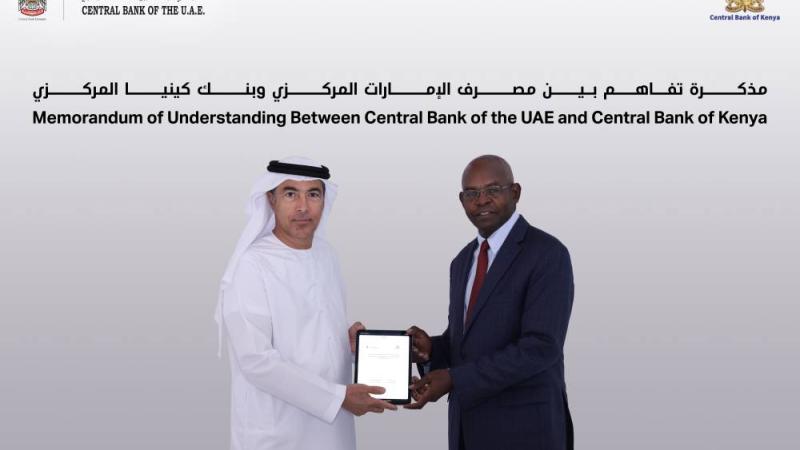 خالد بالعمى وكاماو ثاج خلال توقيع الاتفاقية