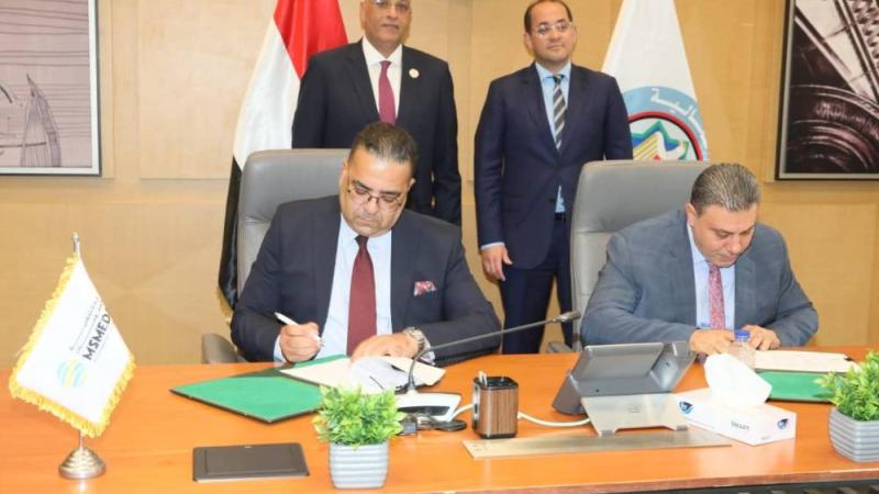 أحمد كجوك وباسل رحمي يشهدان توقيع الاتفاقية