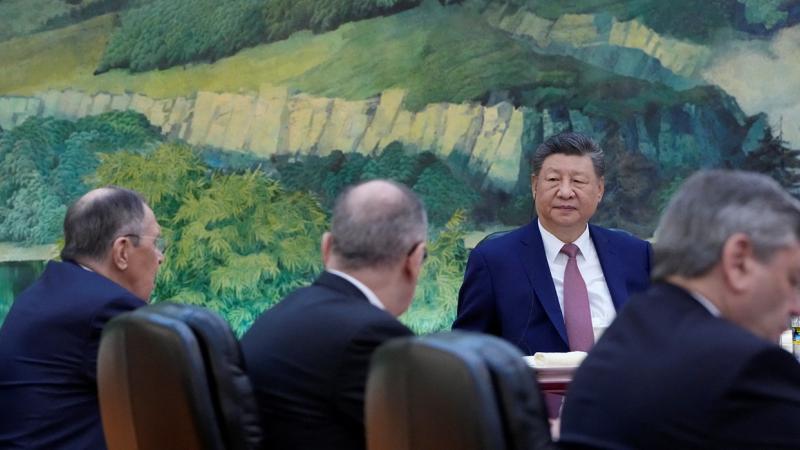 شي خلال الاجتماع مع لافروف