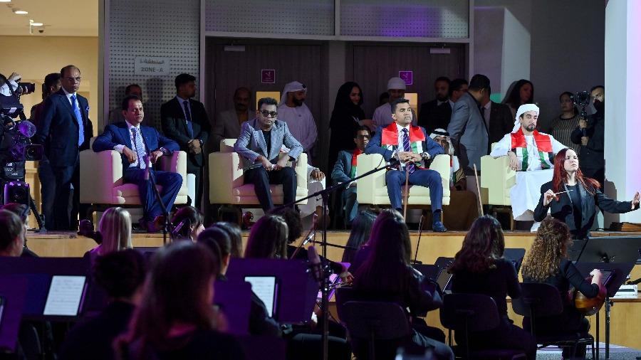 A.R. Rahman and Dr. Shamhseer Vayalil, Founder and Ch (1)airman of Burjeel Holdings, watching Firdaus Orchestra's performance at Burjeel Medical City