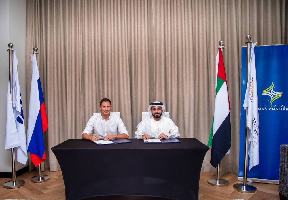  محمد علي الجناحي وديمتري بولياكوف خلال توقيع المذكرة