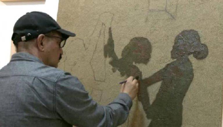  محمد سمارة خلال الرسم 