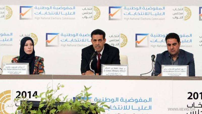 أعضاء مفوضية الانتخابات الليبية خلال مؤتمر صحفي سابق 