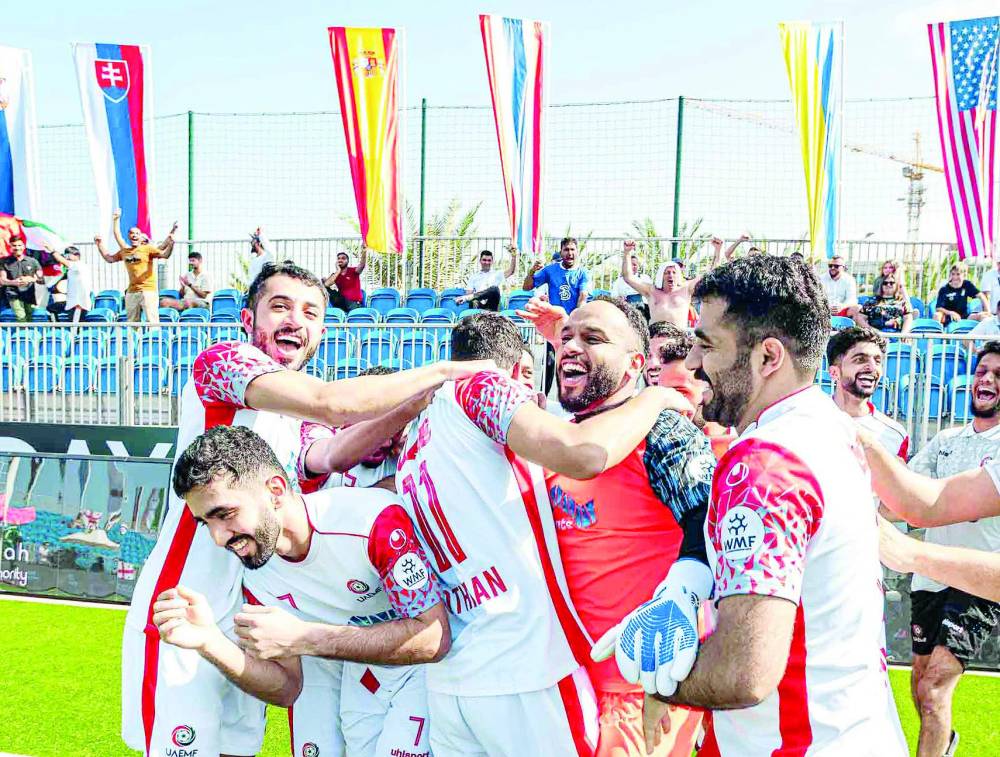 فرحة لاعبي الإمارات بالفوز على جورجيا