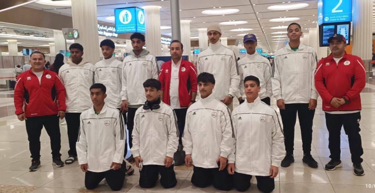 البعثة خلال مغادرتها مطار دبي