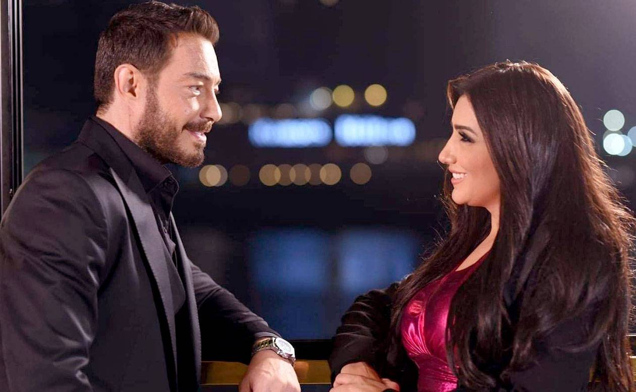 مي عمر وأحمد زاهر في مشهد من «نعمة الافوكاتو»