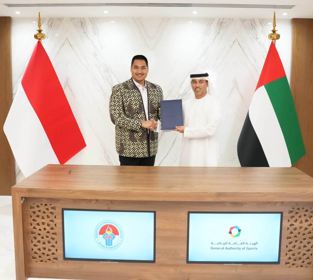 أحمد الفلاسي وأريوتيدجو عقب توقيع الاتفاقية