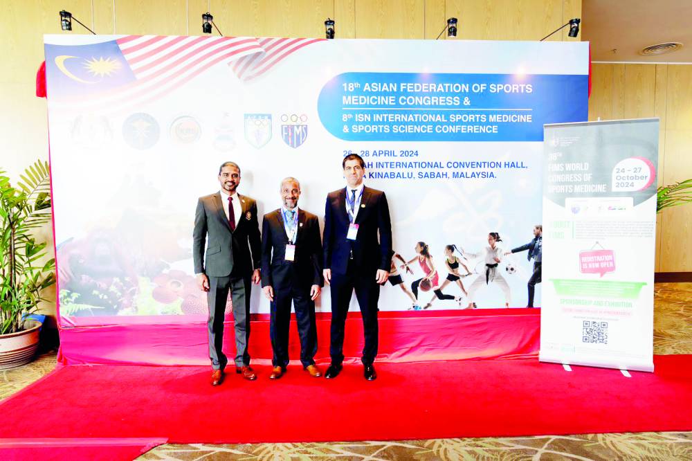 الطنيجي والرحومي خلال المشاركة في اجتماعات الاتحادين الدولي والآسيوي