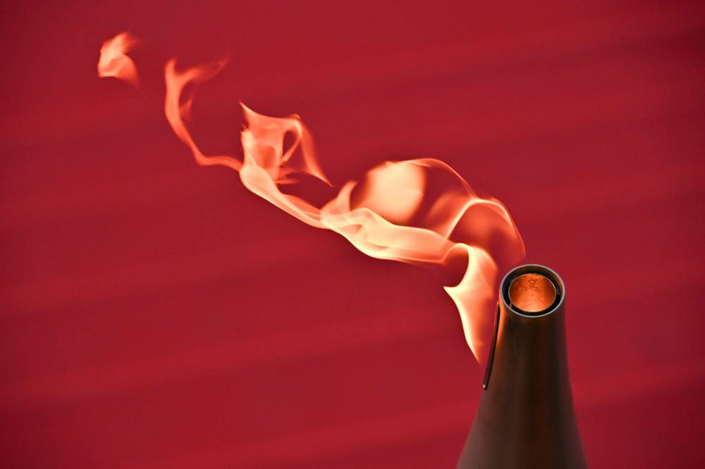 الشعلة الأولمبية (أ.ف.ب)