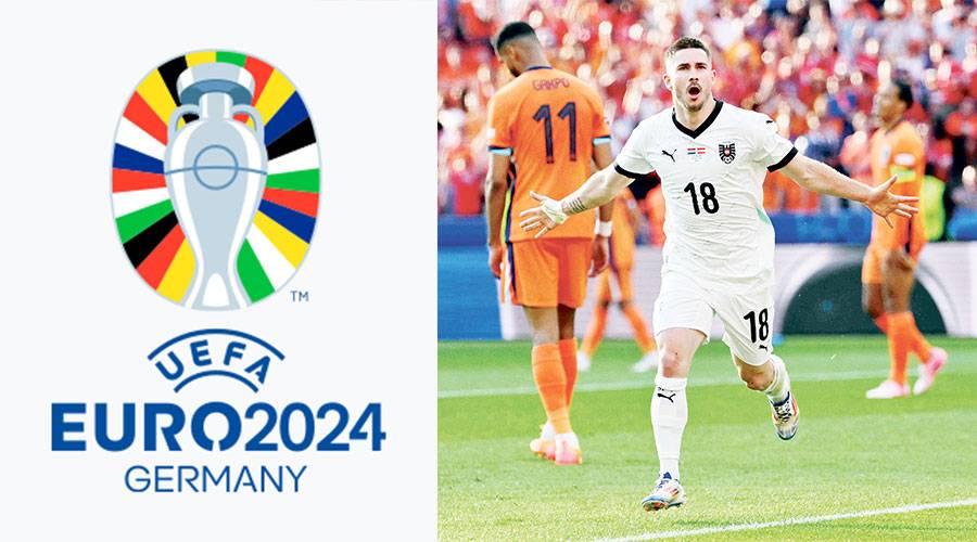 رومانو شميد لاعب النمسا يحتفل بهدفه في مرمى هولندا