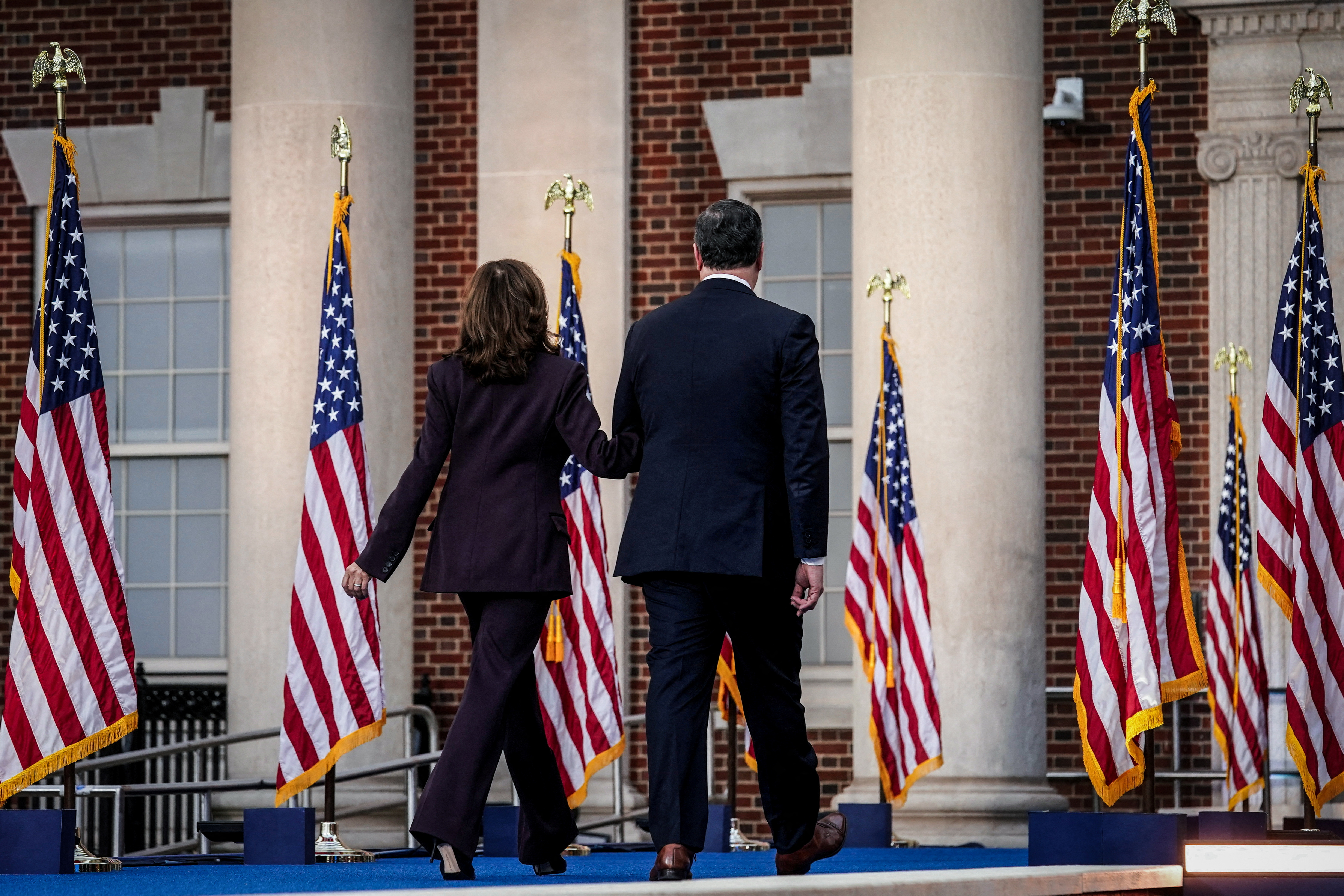 FILE PHOTO: Democratic presidential nominee U.S. Vice President Kamala Harris and her husband Second gentleman Doug Emhoff leave the stage after she delivered remarks, conceding 2024 U.S. presidential election to President-elect Donald Trump, at Howard University in Washington, U.S., November 6, 2024. REUTERS/Kevin Lamarque/File Photo TPX IMAGES OF THE DAY SEARCH «U.S. ELECTION PICTURES» FOR THIS STORY. SEARCH «WIDER IMAGE» FOR ALL STORIES.