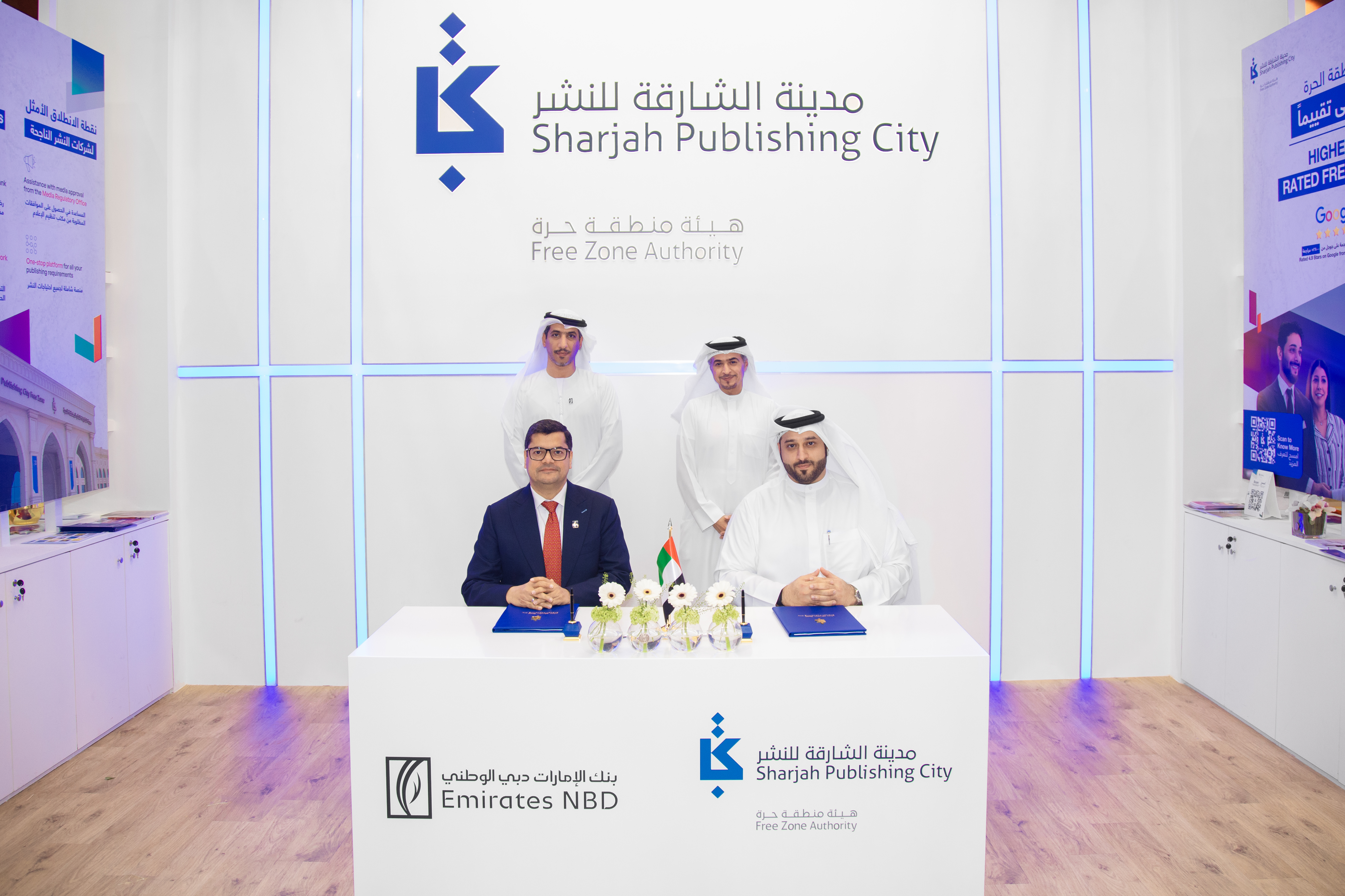 خلال توقيع المذكرة بحضور أحمد العامري