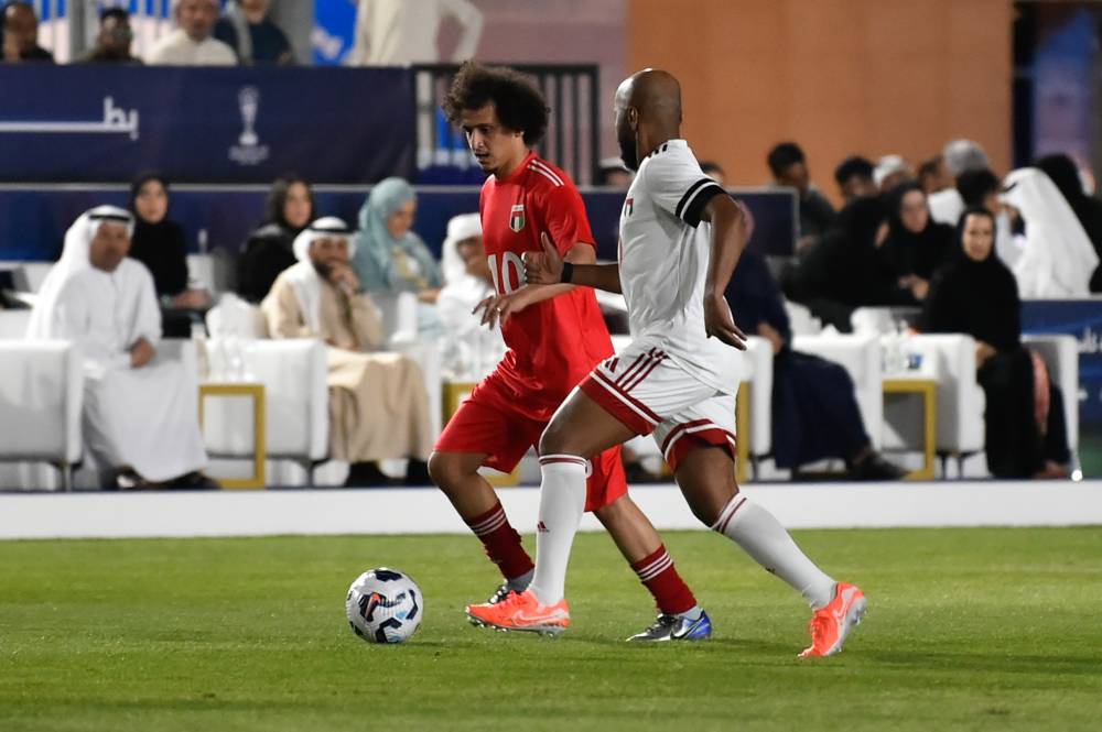 إسماعيل مطر وعمر عبد الرحمن خلال المباراة