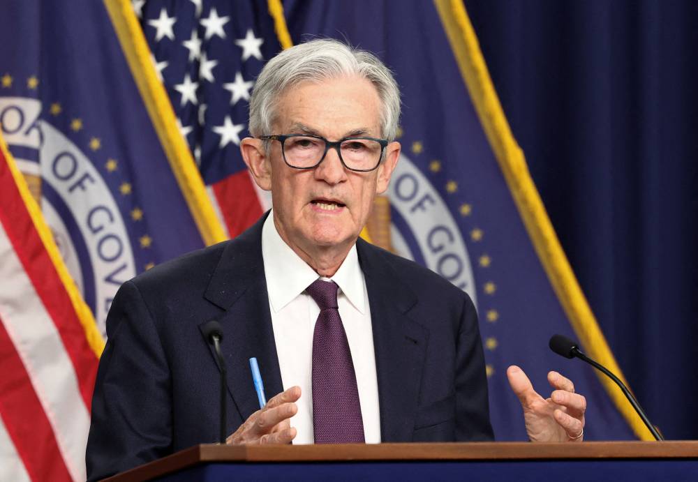 FILE PHOTO: U.S. Federal Reserve Chair Jerome Powell speaks during a press conference following a two-day meeting of the Federal Open Market Committee on interest rate policy in Washington, D.C., U.S., May 7, 2025. REUTERS/Kevin Lamarque/File Photo