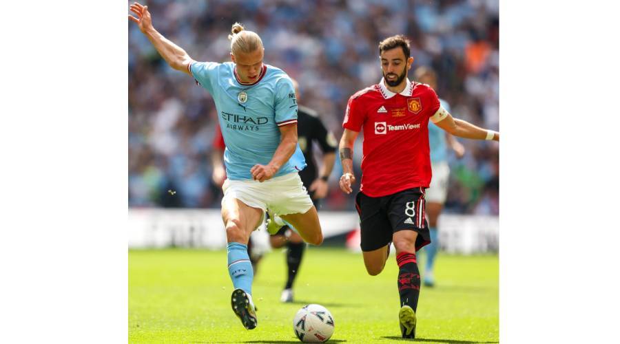 هالاند وفيرنانديز خلال مباراة سابقة بين مانشستر يونايتد وسيتي