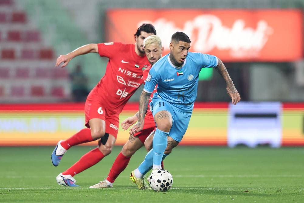 مباراة شباب الأهلي مع دبا (( محمد شعلان ))